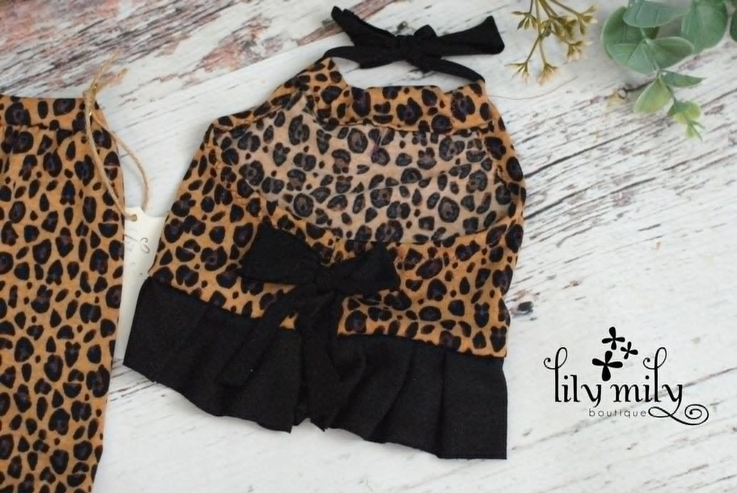 Newborn Cheetah print outfit, bell bottoms and smock top.