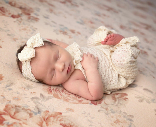 Newborn lace textured romper, daisy print
