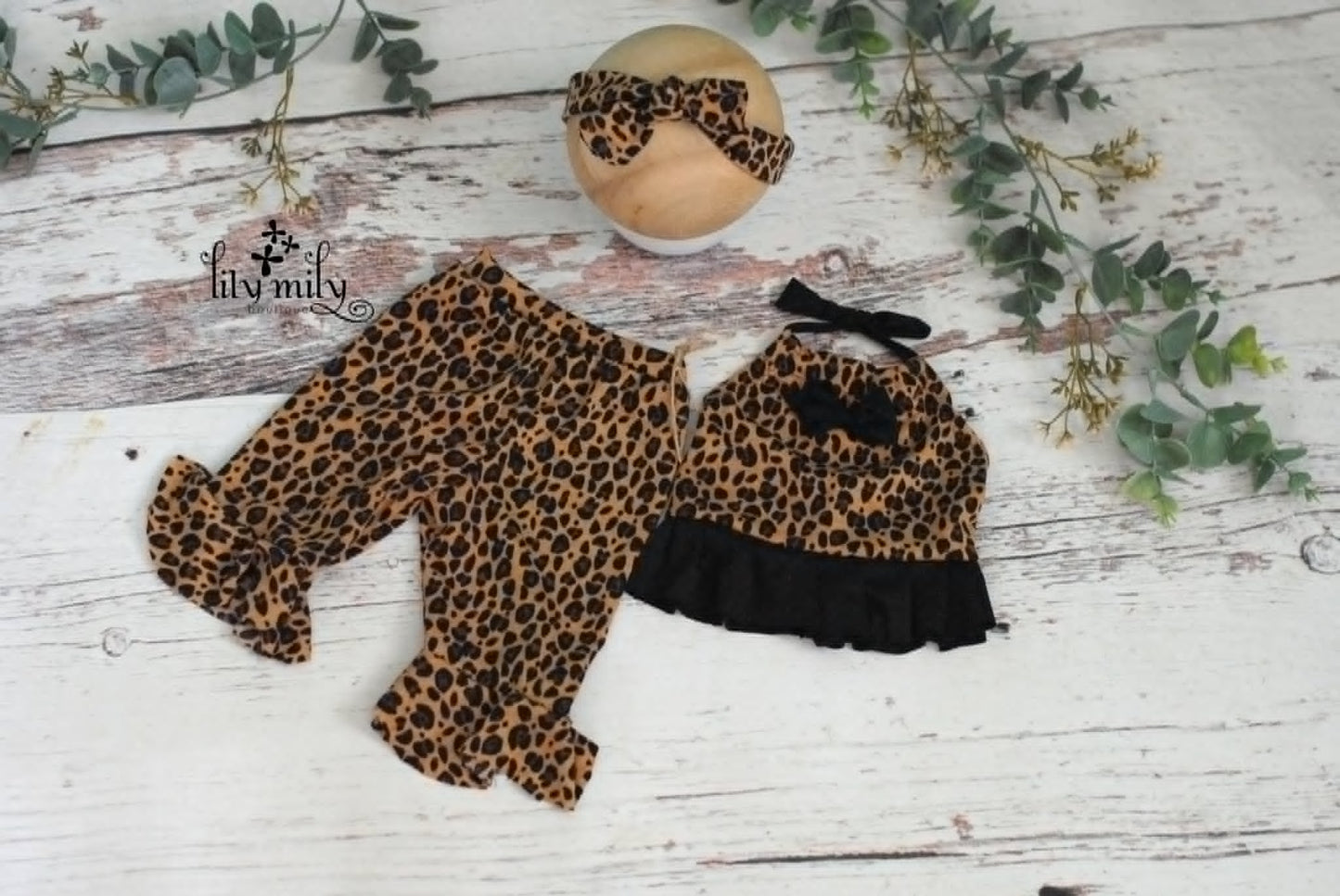Newborn Cheetah print outfit, bell bottoms and smock top.